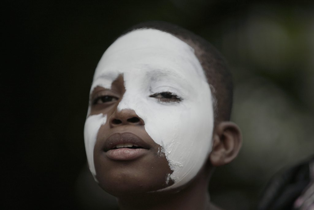 Young boy in Bangui with face paint in the civil war, Central African Republic