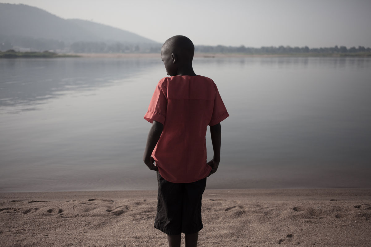 Boy at the shore of the Ubangui river, Bangui, Central African Republic