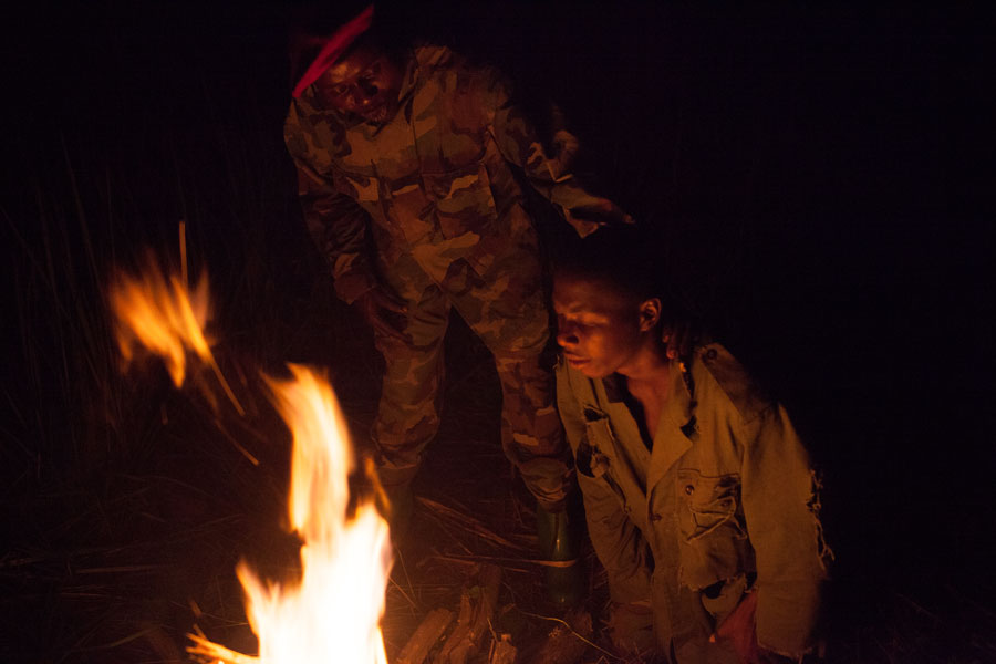 Lord's Resistance Army chief indoctrinates an abducted child soldier, northeastern Democratic Republic of Congo